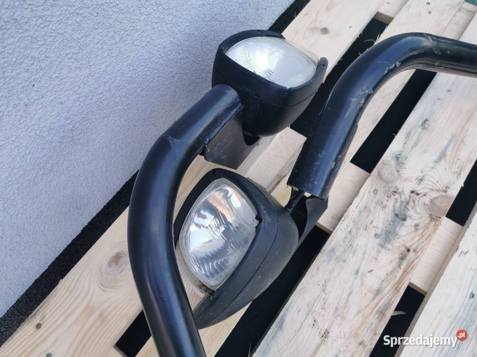 Lampa lewa przednia CAT TH 330B wielkopolskie Wilkowo