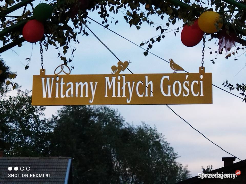 Napis na bramę malowany proszkowo na złoto Mielec
