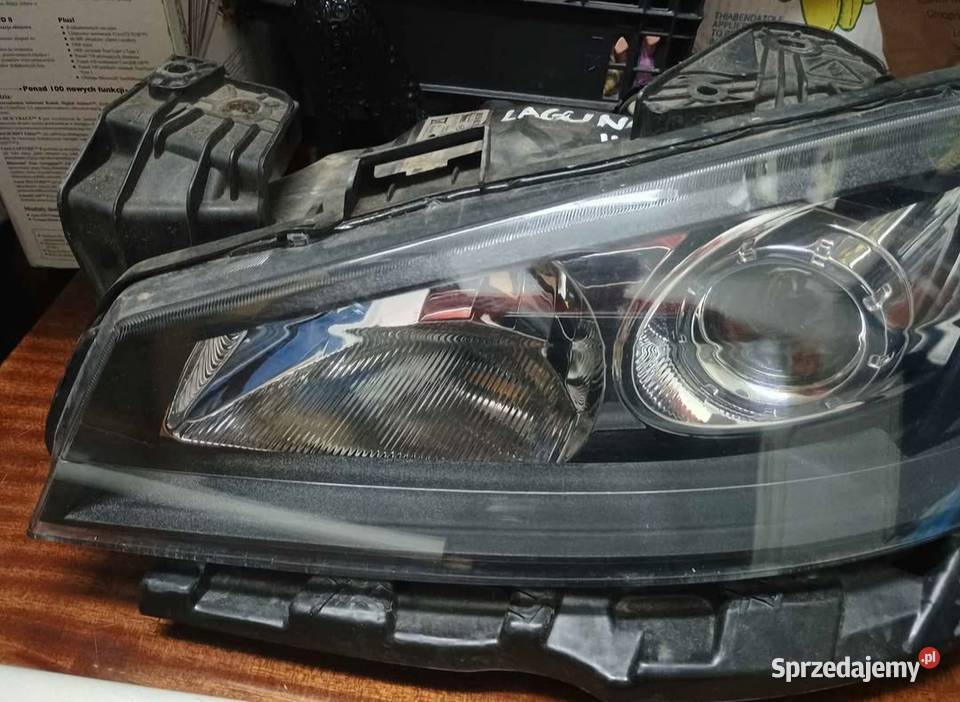 Renault Laguna II FL Lampa przednia ksenon lewe Poznań