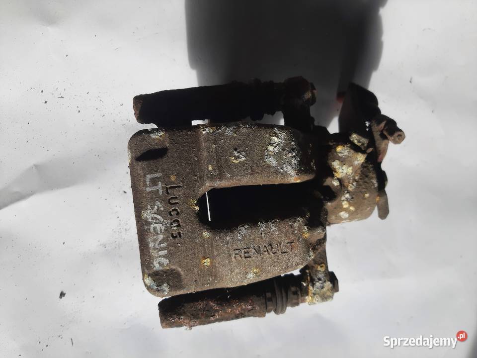 Renault Scenic 1 zacisk hamulcowy lewy tylny