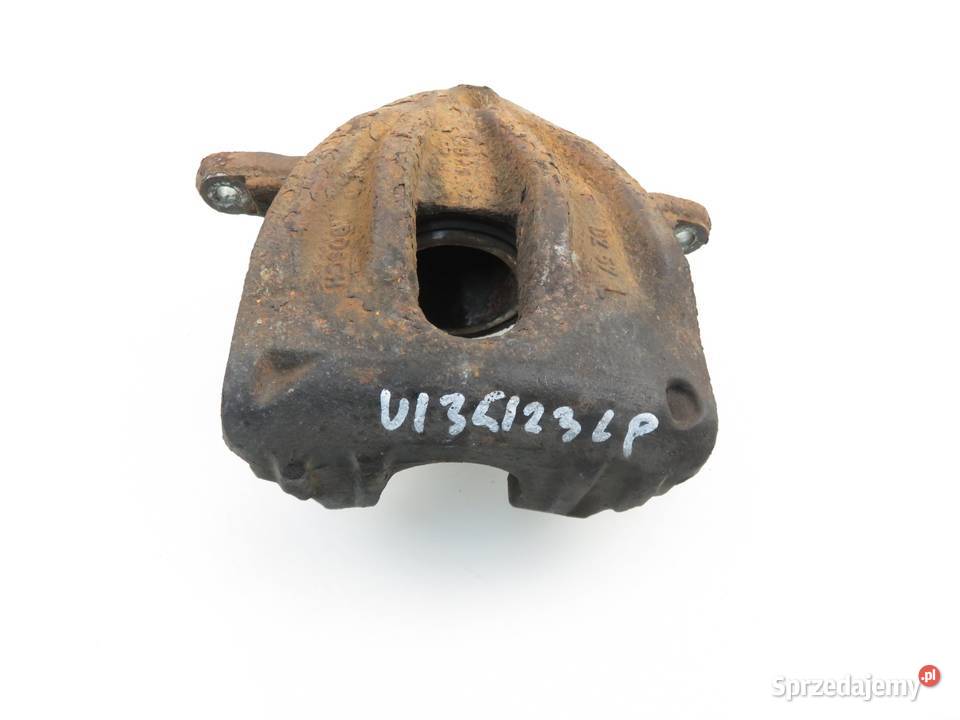 ZACISK LEWY PRZÓD TOYOTA AVENSIS II T25 22 DCAT