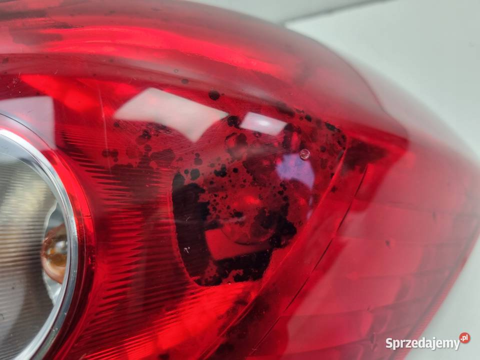 LAMPA PRAWA OPEL CORSA D 3D HTB 0614r TYLNIA