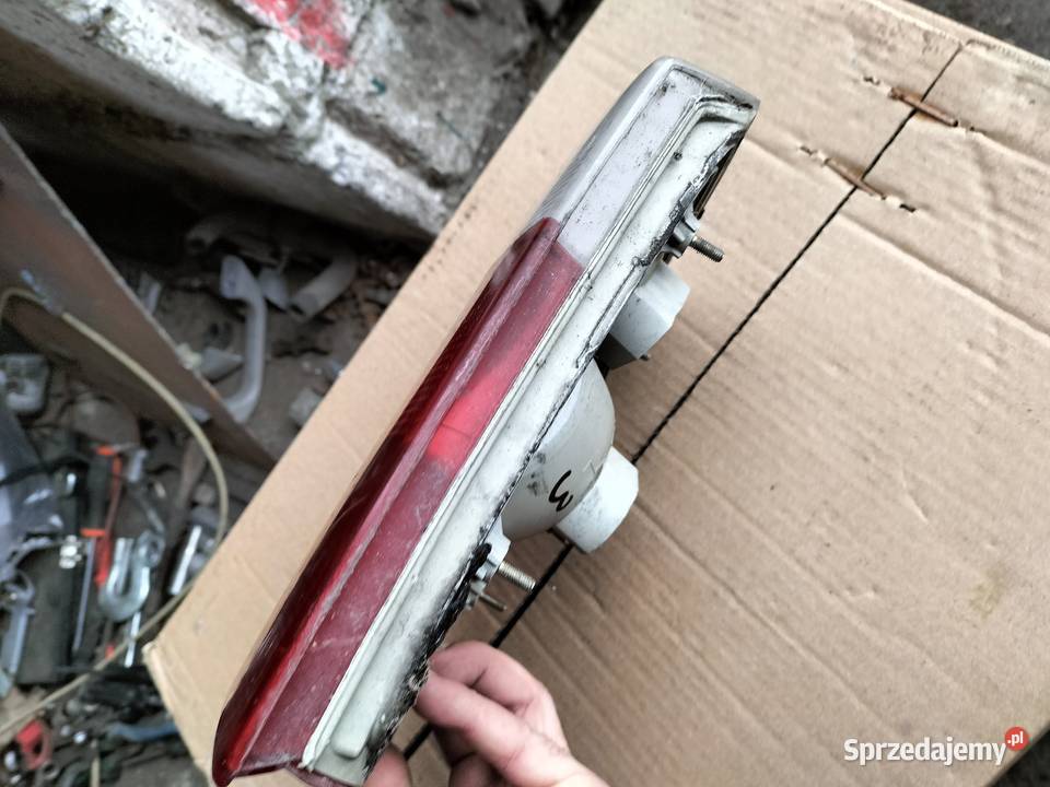 LAMPA TYŁ TYLNA LEWA Audi 80 LEFT 893945093G Oświetlenie lubelskie Kamień-Kolonia