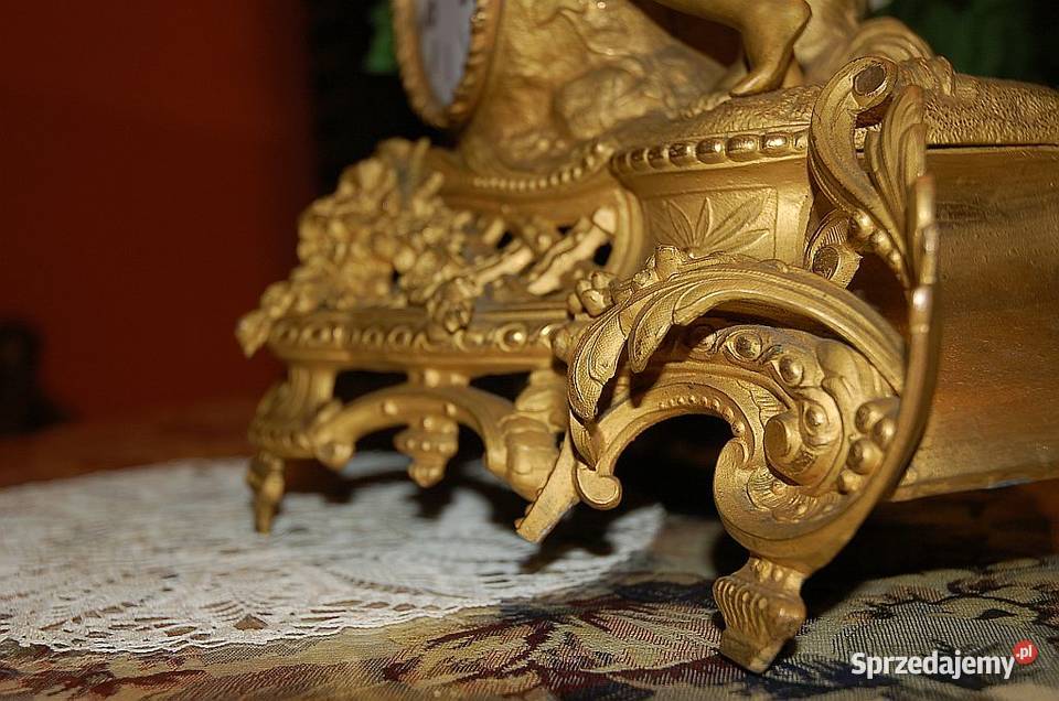 B duży zegar kominkowy anił z dzieckiem Antyki Machnacz