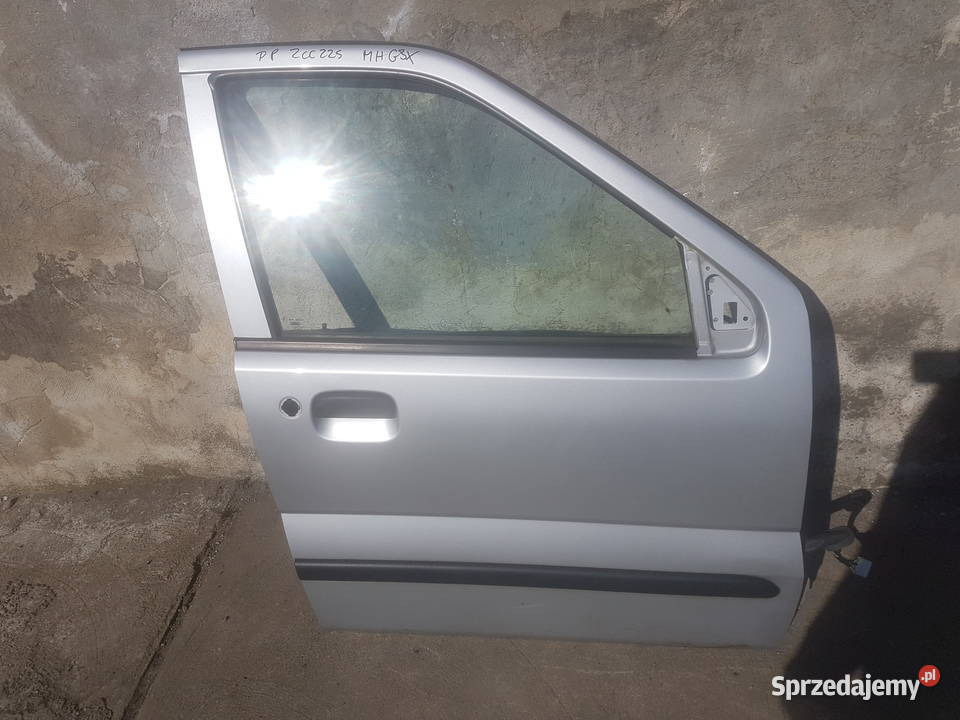 Suzuki Ignis MH Subaru G3X drzwi prawe srebrny osobowe