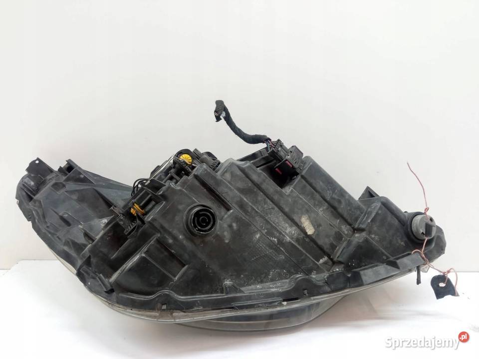 LAMPA PRZÓD LEWA EU 90006547 Opel Corsa IV osobowe Lampy przednie