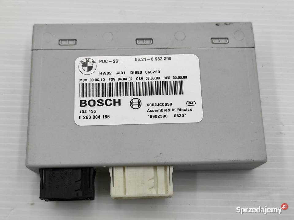 MODUŁ STEROWNIK PDC BMW E90 E91 6982390 Części samochodowe wielkopolskie
