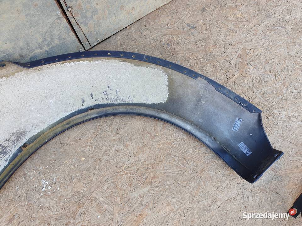 VW BEETLE 1C0 BŁOTNIK PRAWY PRZÓD 1C0821106F Międzychód