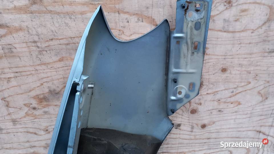 VW TOURAN I CADDY II BŁOTNIK PRZÓD LEWY LB5S Zbierkowo
