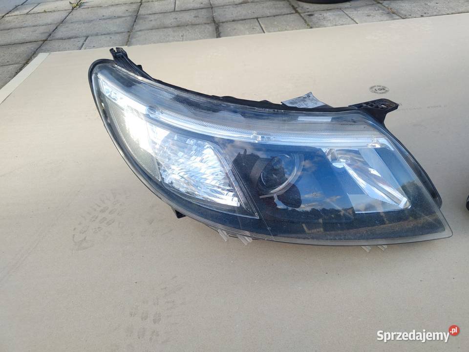 Reflektor komplet Saab 93 lift Oryginalny Lampy przednie Małyszyn Dolny
