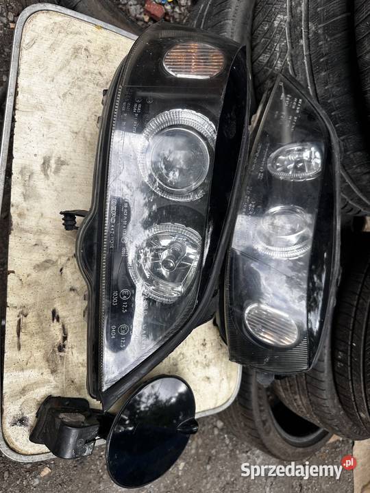 Opel Bertone błotnik rozrusznik lampy przód Tywonia
