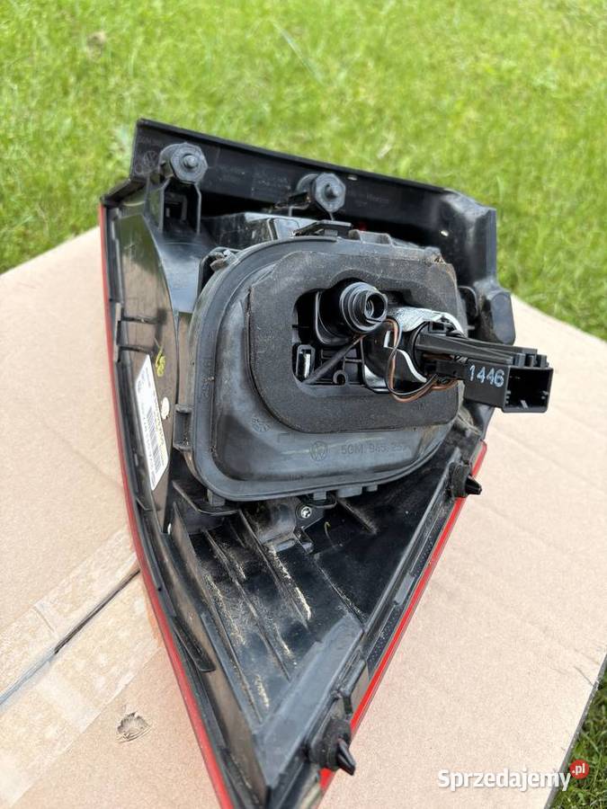 Oryginalne tylne lampy VW Golf 7 HELLA komplet