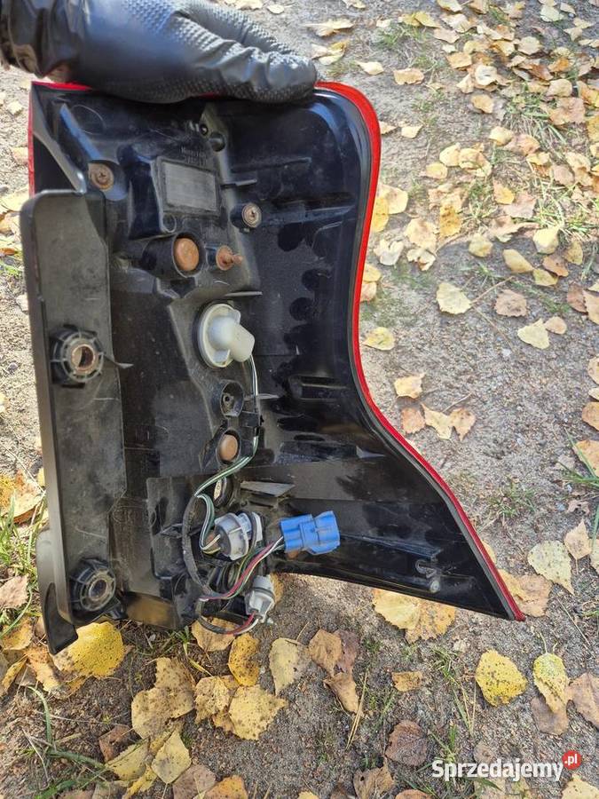 LAMPA TYLNA TOYOTA LAND CRUISER LEWA ORYGINAŁ terenowe Pionki