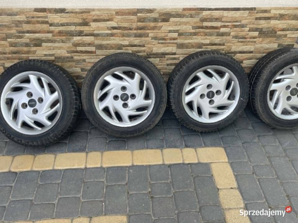 13 SEICENTO ALUFELGI OPONY Mokre sprzedam