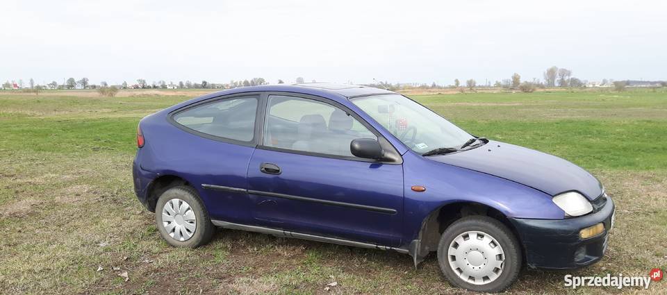 Mazda 323c automat granatowa aktualne opłaty
