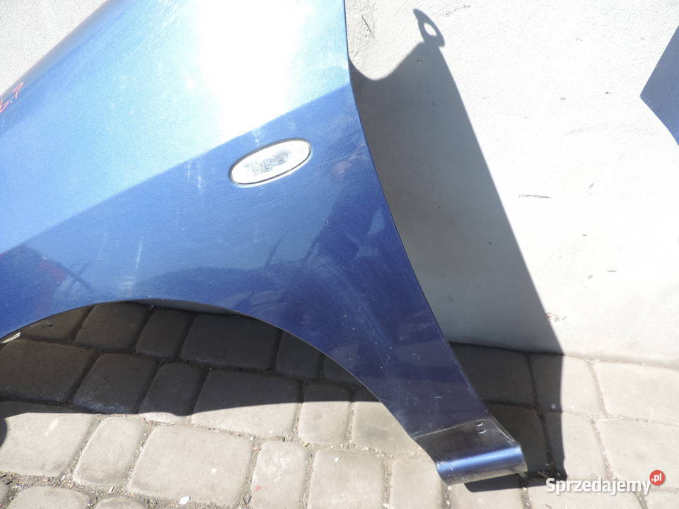 SUZUKI LIANA BŁOTNIK LEWY PRZÓD PRZEDNI Z2U małopolskie Nowy Sącz