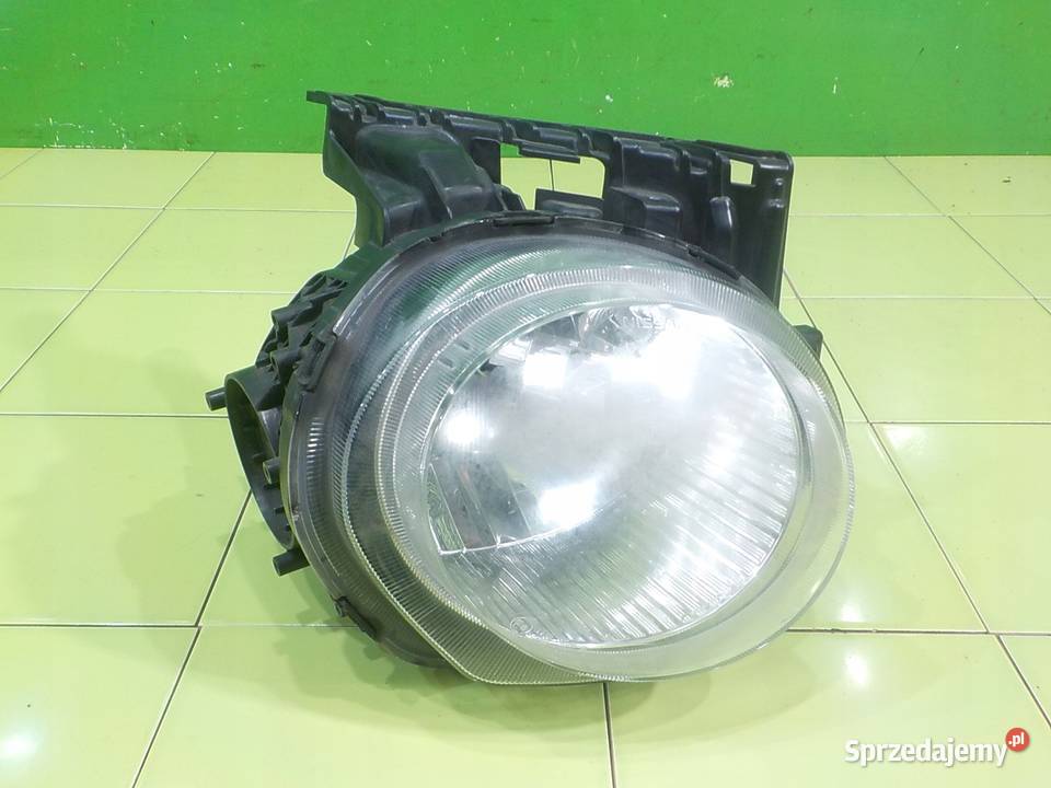 NISSAN JUKE I F15 15 DCI 11r lampa prawa przod Lampy przednie Suków