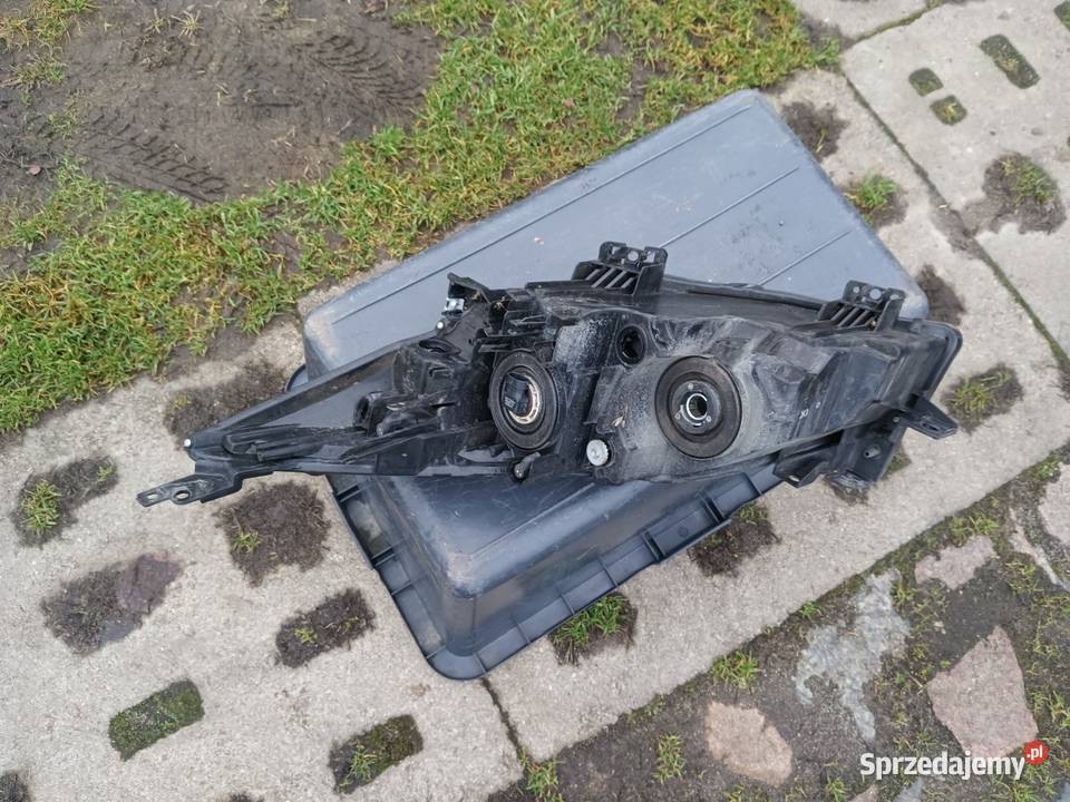 Mazda BL II 0811 reflektor lewy prawy europa