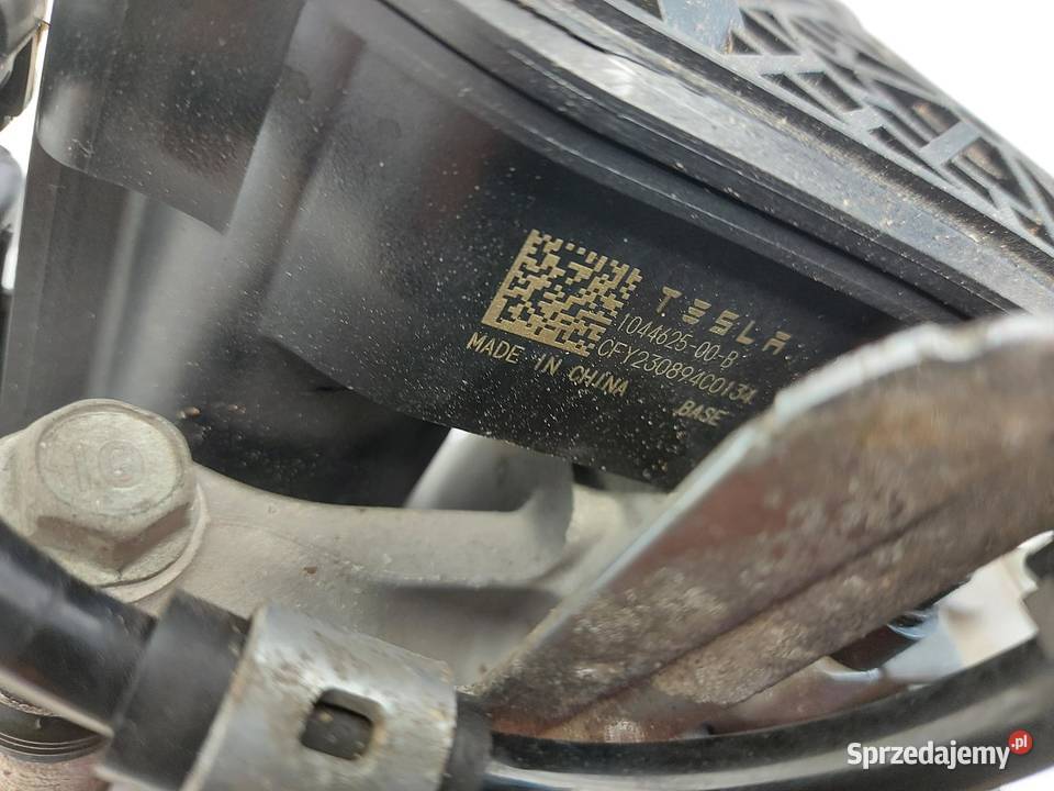 TESLA MODEL Y 2023r Zacisk hamulcowy tył lewy Zaciski i jarzma