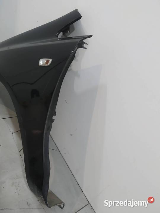 BŁOTNIK LEWY PRZÓD Z20R Opel Corsa IV 20062014 D
