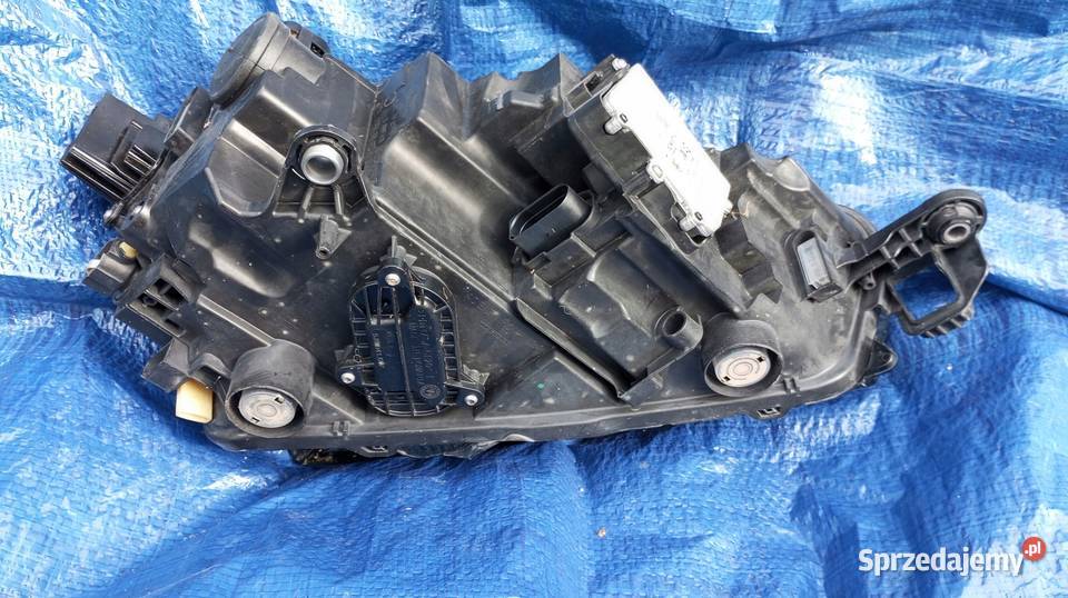 657941015A SKODA SCALA LAMPA REFLEKTOR LEWY Nowy Tomyśl