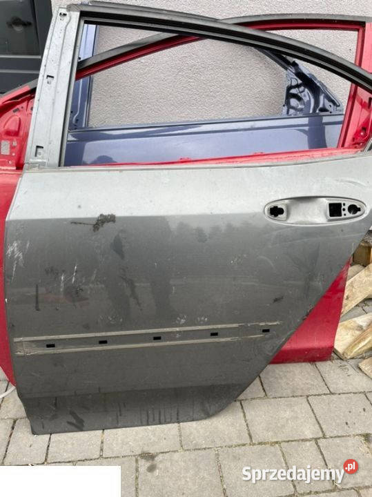 Honda City II drzwi lewy tył 08 Karoseria Kozubszczyzna