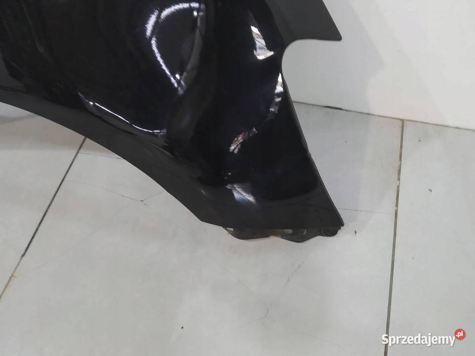 BŁOTNIK PRAWY PRZÓD 209 Toyota Yaris II 20052011