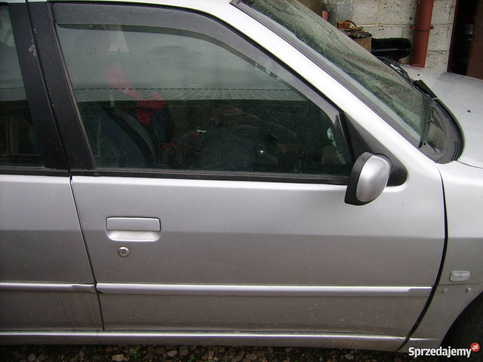Drzwi przednie prawe Peugeot 306 kod lakieru EYCC srebrne