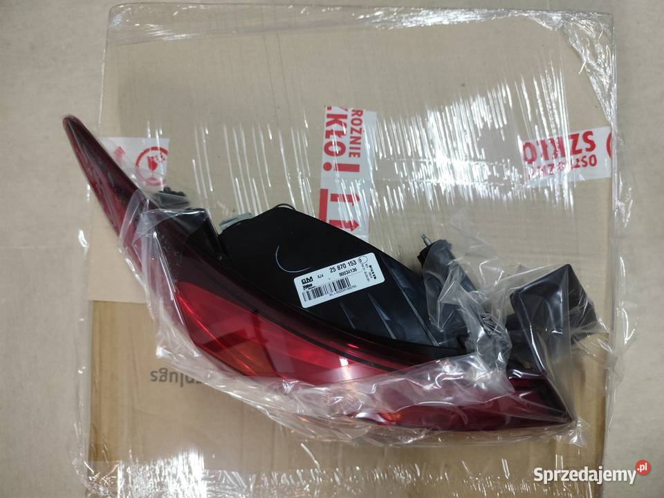 NOWA Lampa tylna lewa Opel Astra J sedan 2009 Lampy tylne Poznań