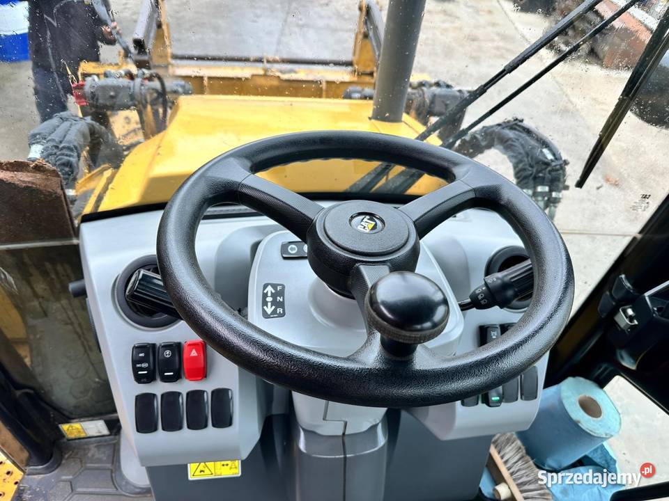 Koparko ładowarka CAT 428 Tokarnia