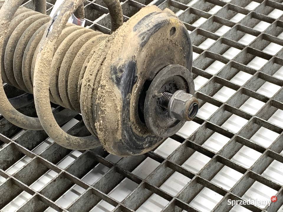 AMORTYZATOR LEWY PRZÓD ZE SPRĘŻYNĄ PEUGEOT 2008