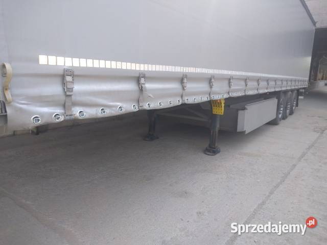 MontażWymiana oczek w bokach naczepy TIR kotara