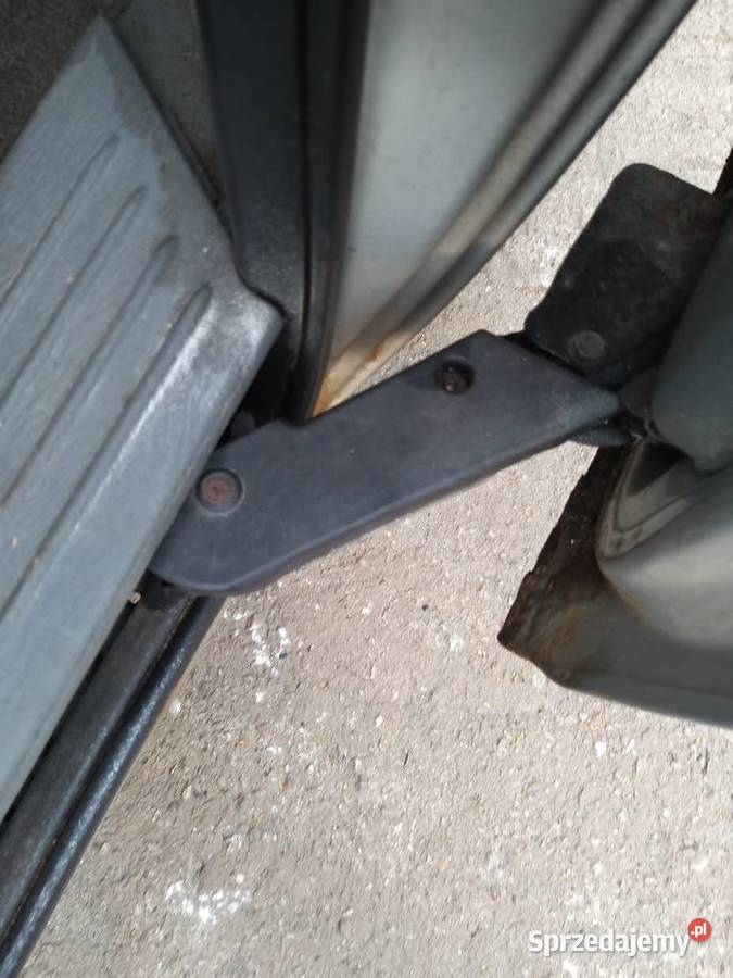 MECHANIZM DRZWI OTWIERANYCH ELEKTRYCZNIE Kawnice