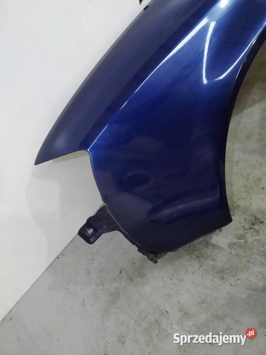 BŁOTNIK LEWY PRZÓD GRANATOWY Audi A6 II 19972004 Rok produkcji 1999