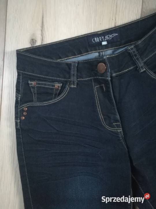 Damskie spodnie z ciemnego denimu w idealnym Dębica