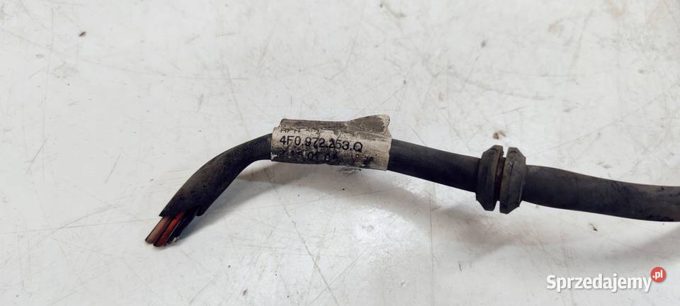 WIĄZKA ZACISKU LEWY TYŁ AUDI A6 C6 4F0972253Q