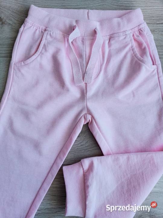 Spodnie dziewczęce dresowe sportowe różowe 92 Spodnie Płock