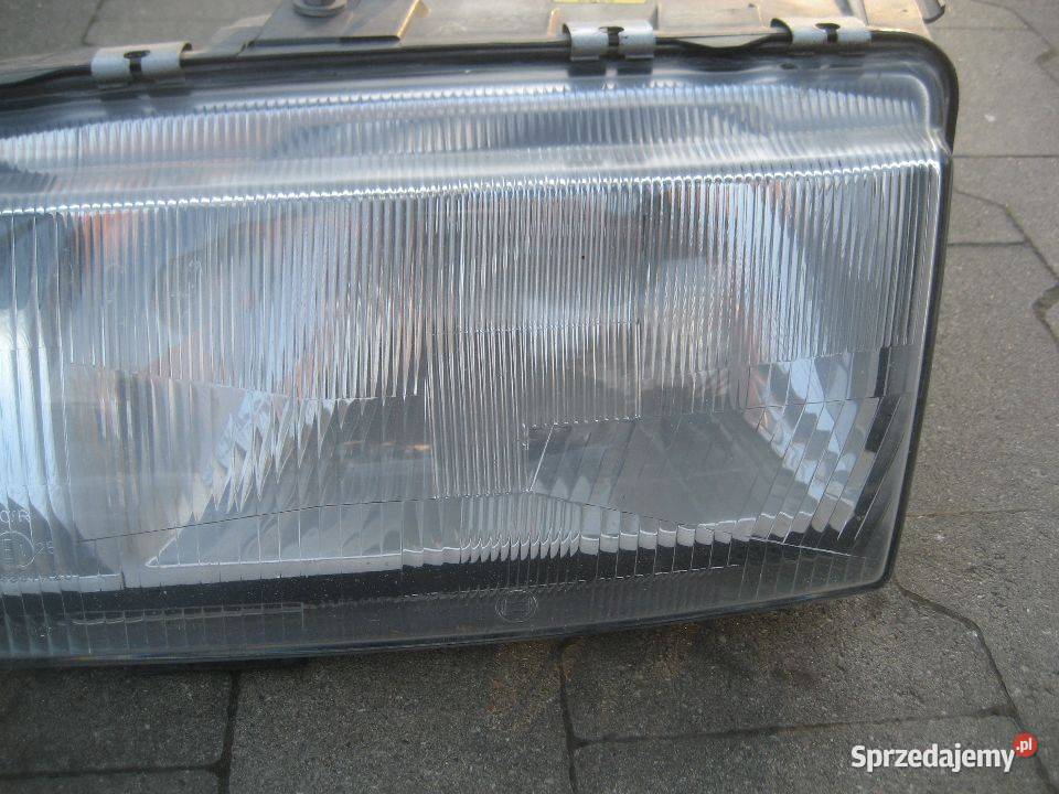 ford sierra 8793r lampa przód lewa oryginalna Lampy przednie Rakoniewice sprzedam