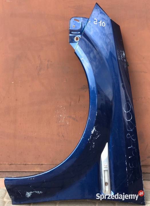 Błotnik Przód Przedni Lewy Opel Tigra B kod Skołoszów sprzedam