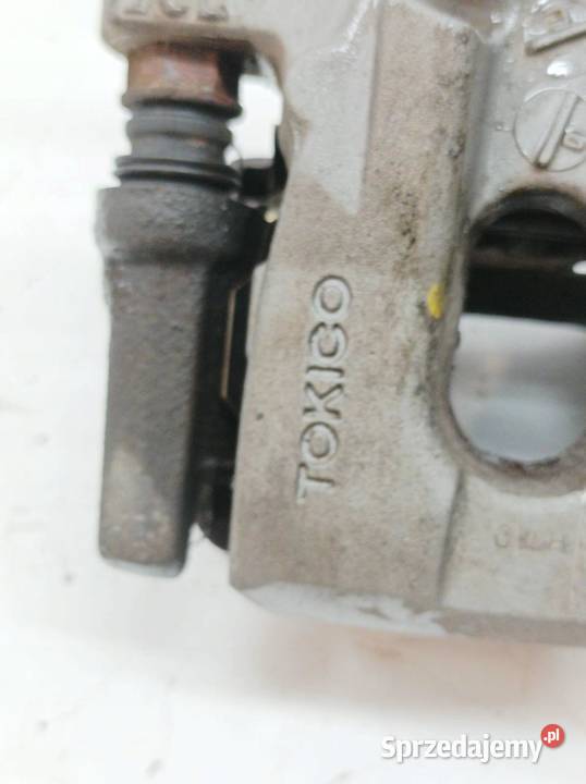 ZACISK HAMULCOWY LEWY TYŁ 18 PLUGIN XW50 Toyota
