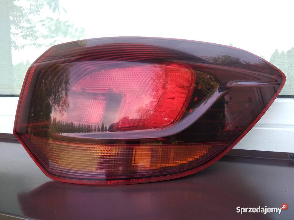 Opel Astra J kombi lampa tył tylna prawa narożna Sieradz