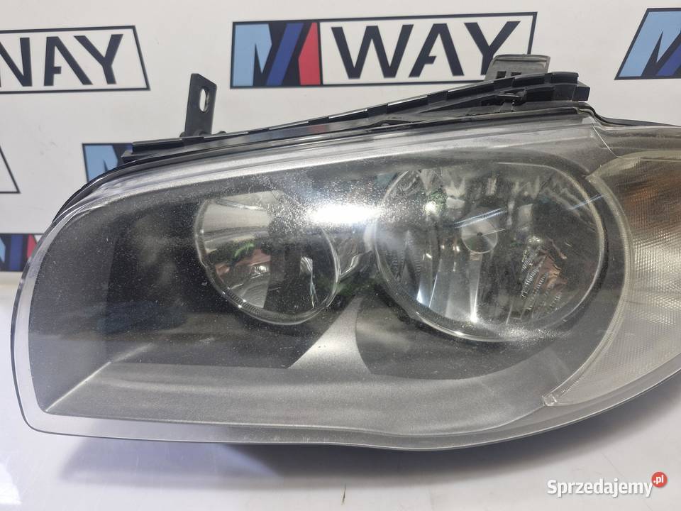 BMW E81 E82 E87 LAMPA LEWY PRZÓD ORYGINAŁ