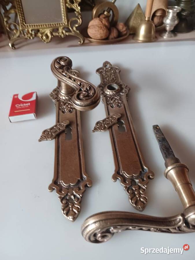 Komplet pięknych szyldów i klamek mosiężnych Poznań