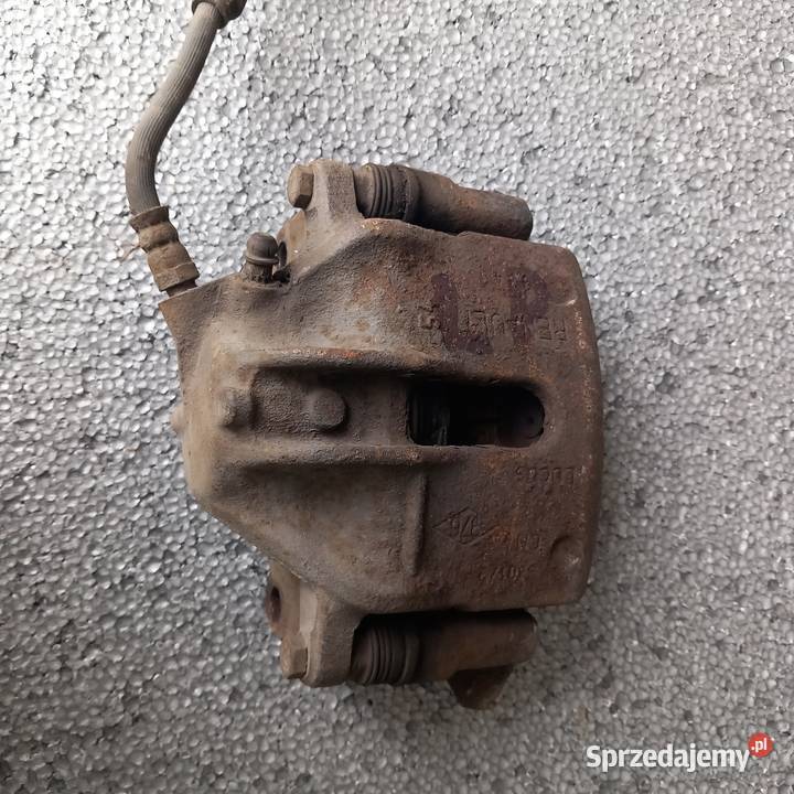 Lewy zacisk przód do Renault Scenic I Lift 19 Zaciski i jarzma Układ hamulcowy Sosnowiec