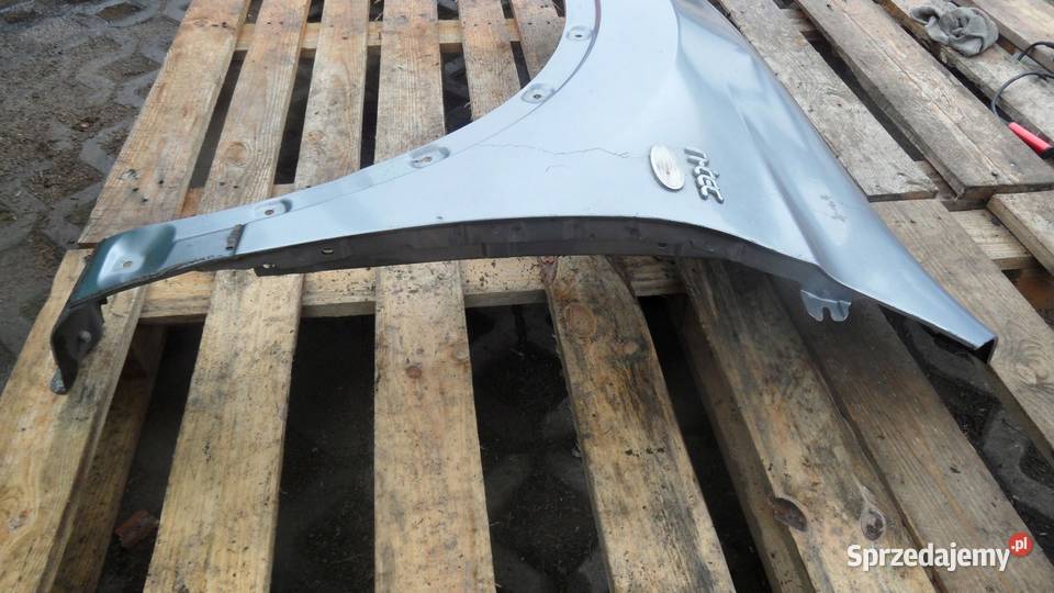 NISSAN QASHQAI I J10 LIFT 10r błotnik lewy przód