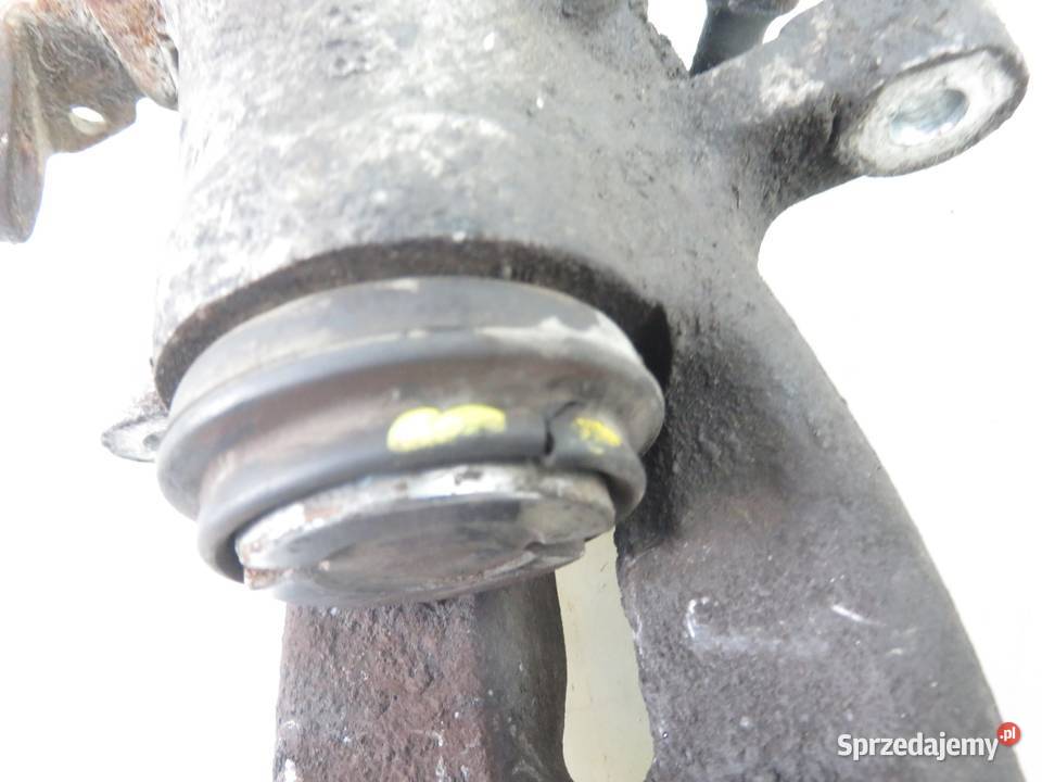 ZACISK LEWY TYŁ OPEL ASTRA III H GTC osobowe