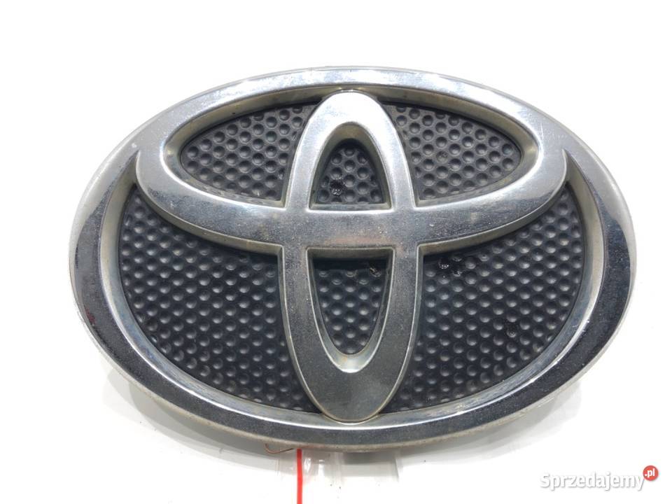 EMBLEMAT LOGO ZNACZEK PRZÓD TOYOTA COROLLA E13 osobowe Listwy i nakładki