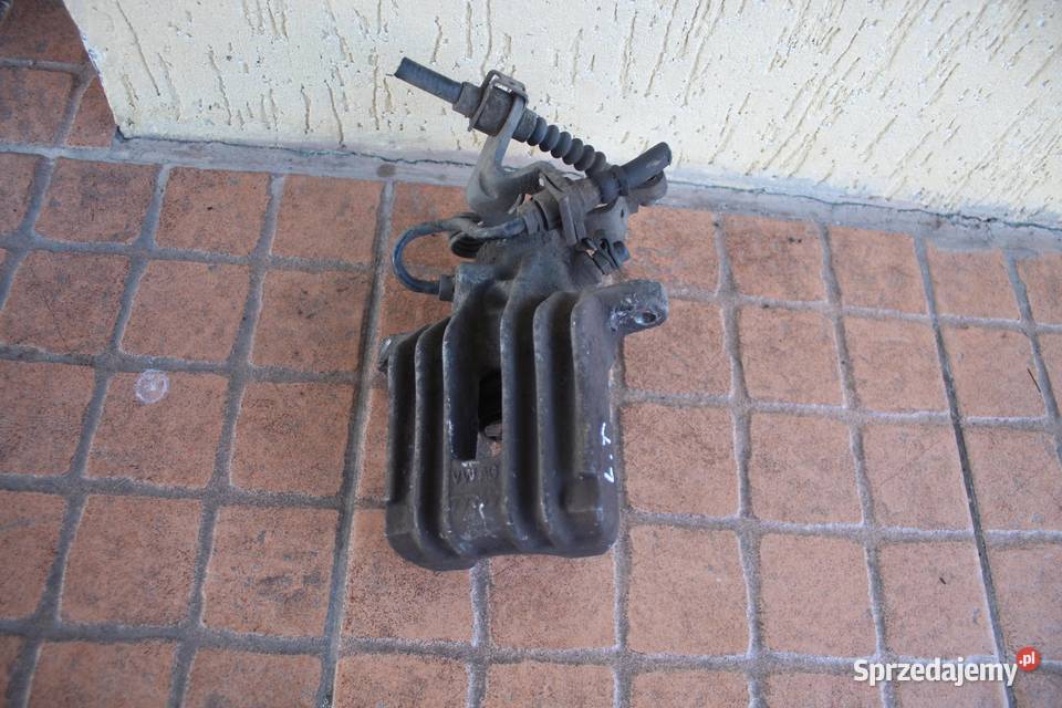 ZACISK HAMULCOWY LEWY TYŁ SEAT ALTEA 16