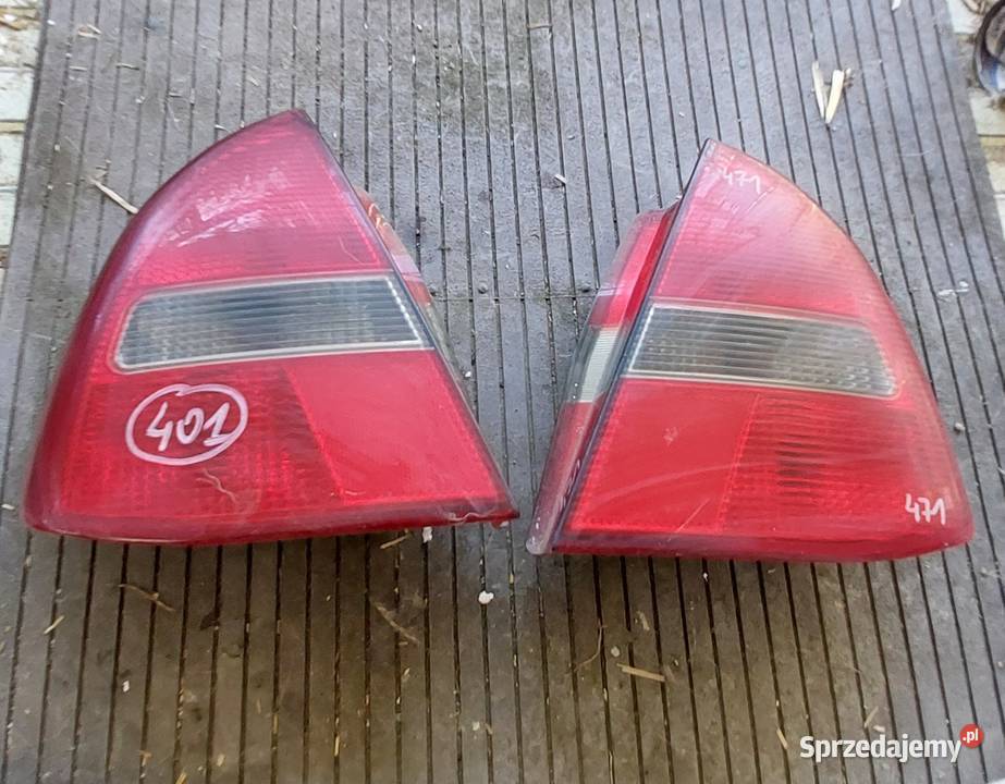 Mitsubishi Carisma lampa tył prawa lewa osobowe Byków