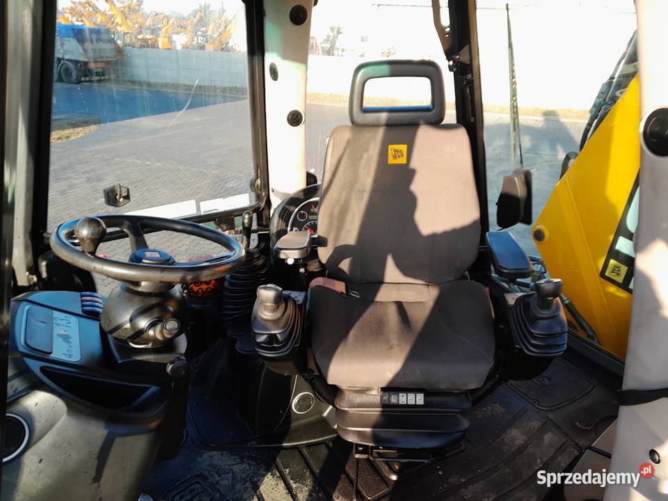 KOPARKOŁADOWARKA JCB CAT CASE LONKING VOLVO NEV
